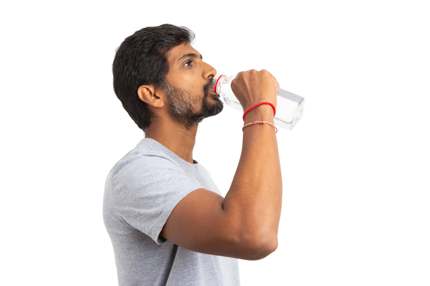 Indian man drinking water